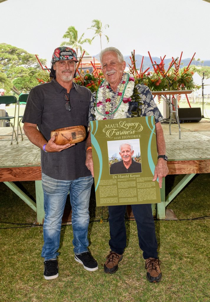 Dr. Keyser’s son Jonathan (left) is helping to carry on his father’s agriculture legacy.